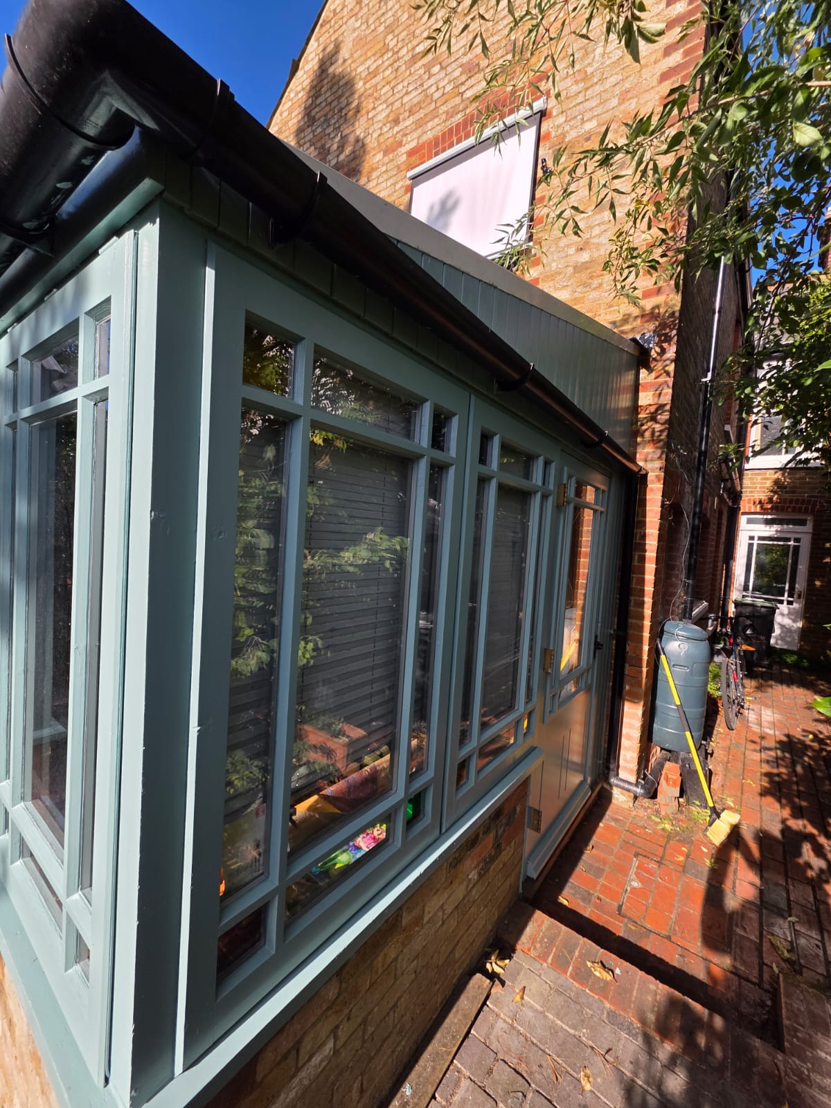 Conservatory side panels finished in sage green
