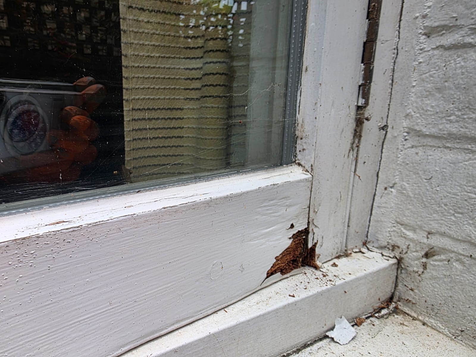 Window sill before, with rot at the joint