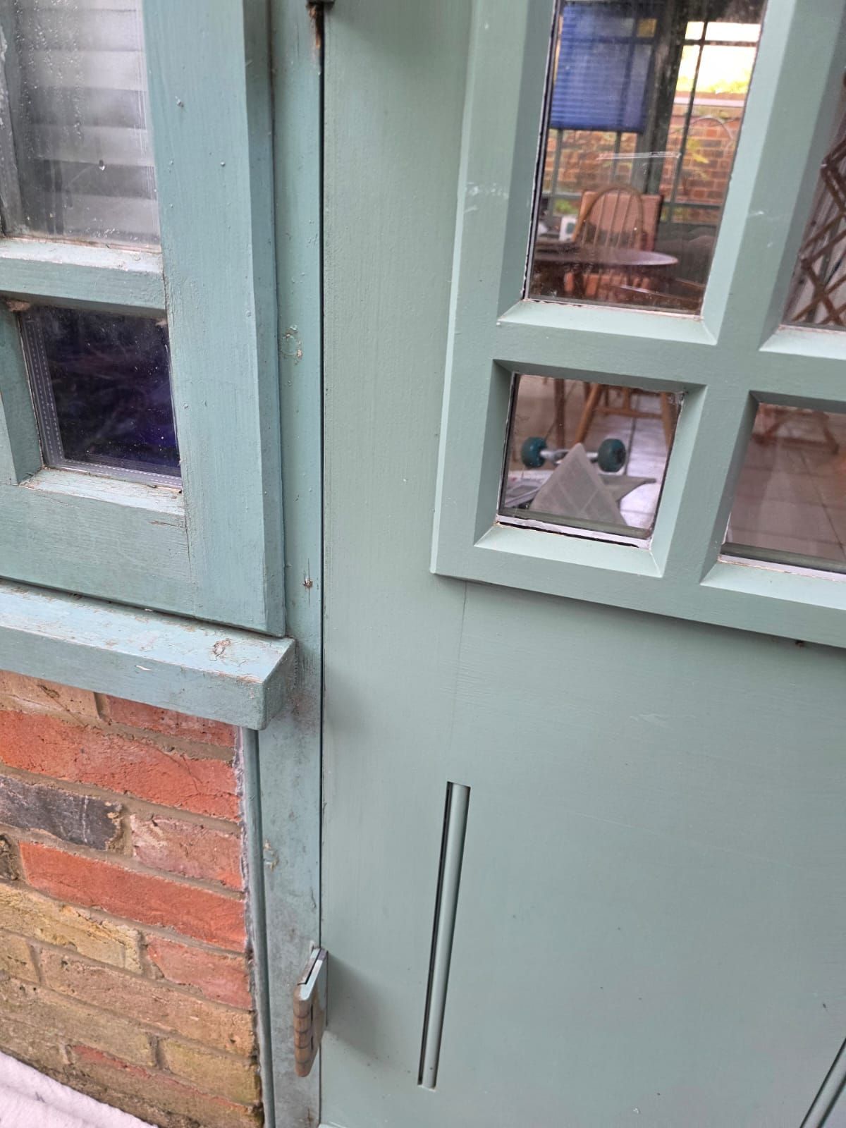 Conservatory door before, with worn paint