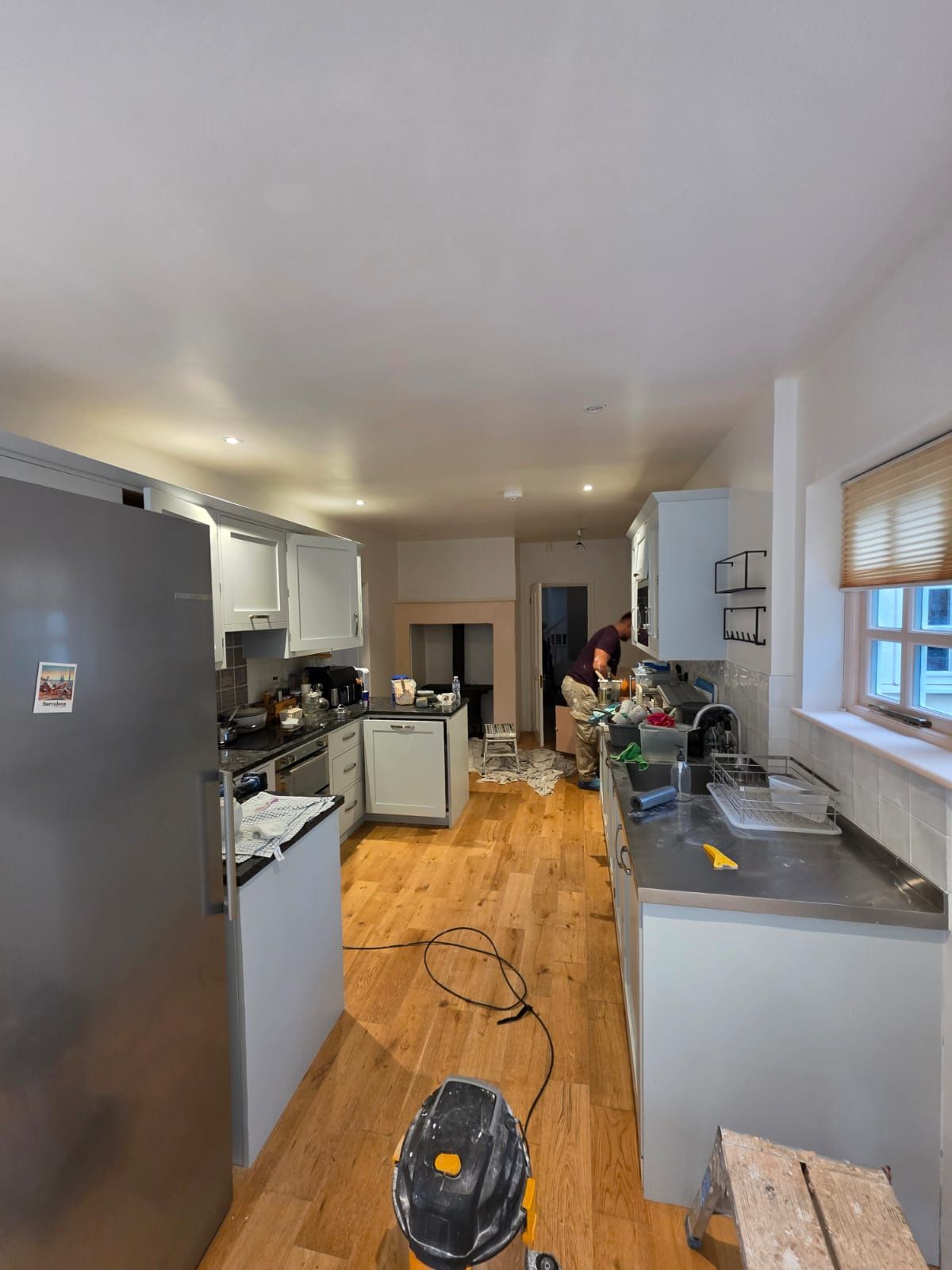 Kitchen during the job, with floors protected