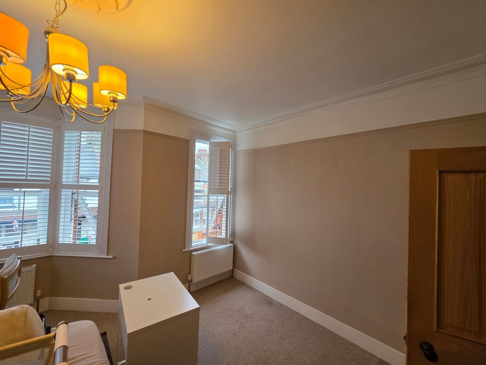 Bay-fronted room with fresh neutral walls
