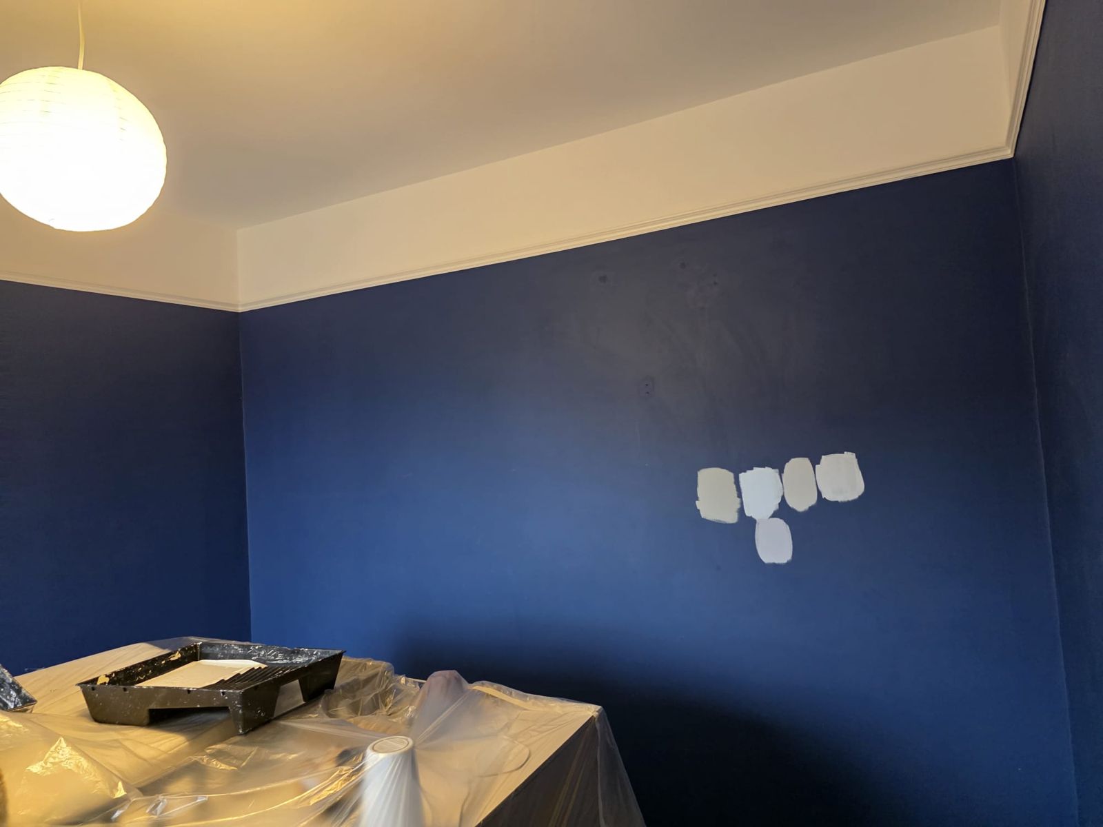 Navy bedroom wall before
