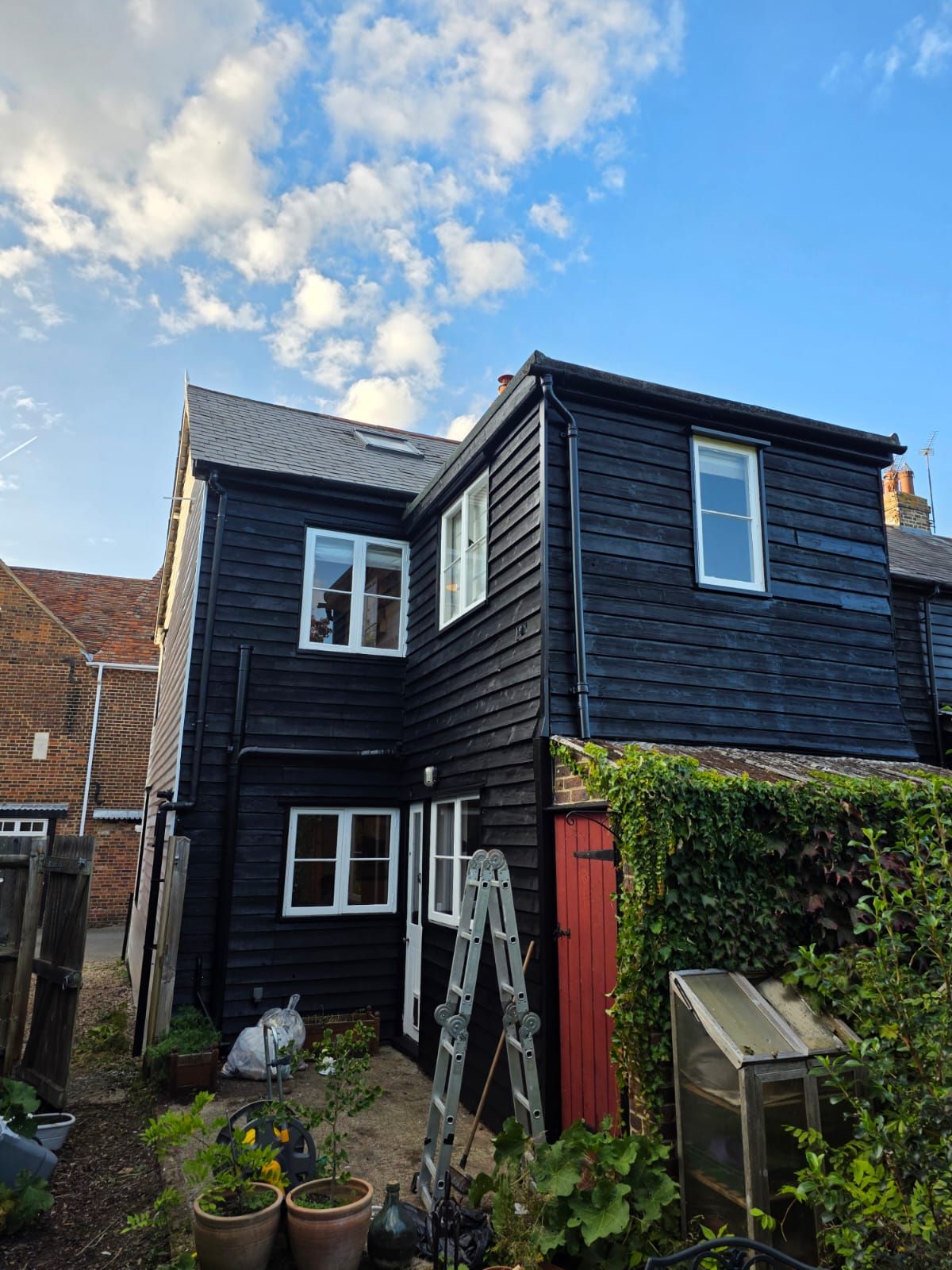 Rear of the cottage finished in black