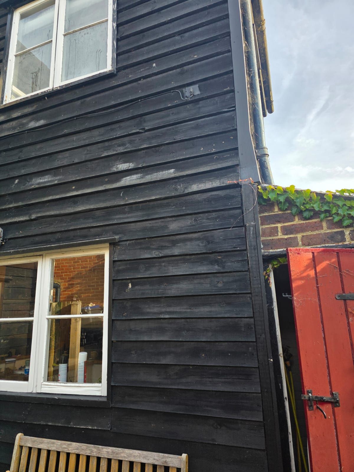 Corner of the rear weatherboarding after painting