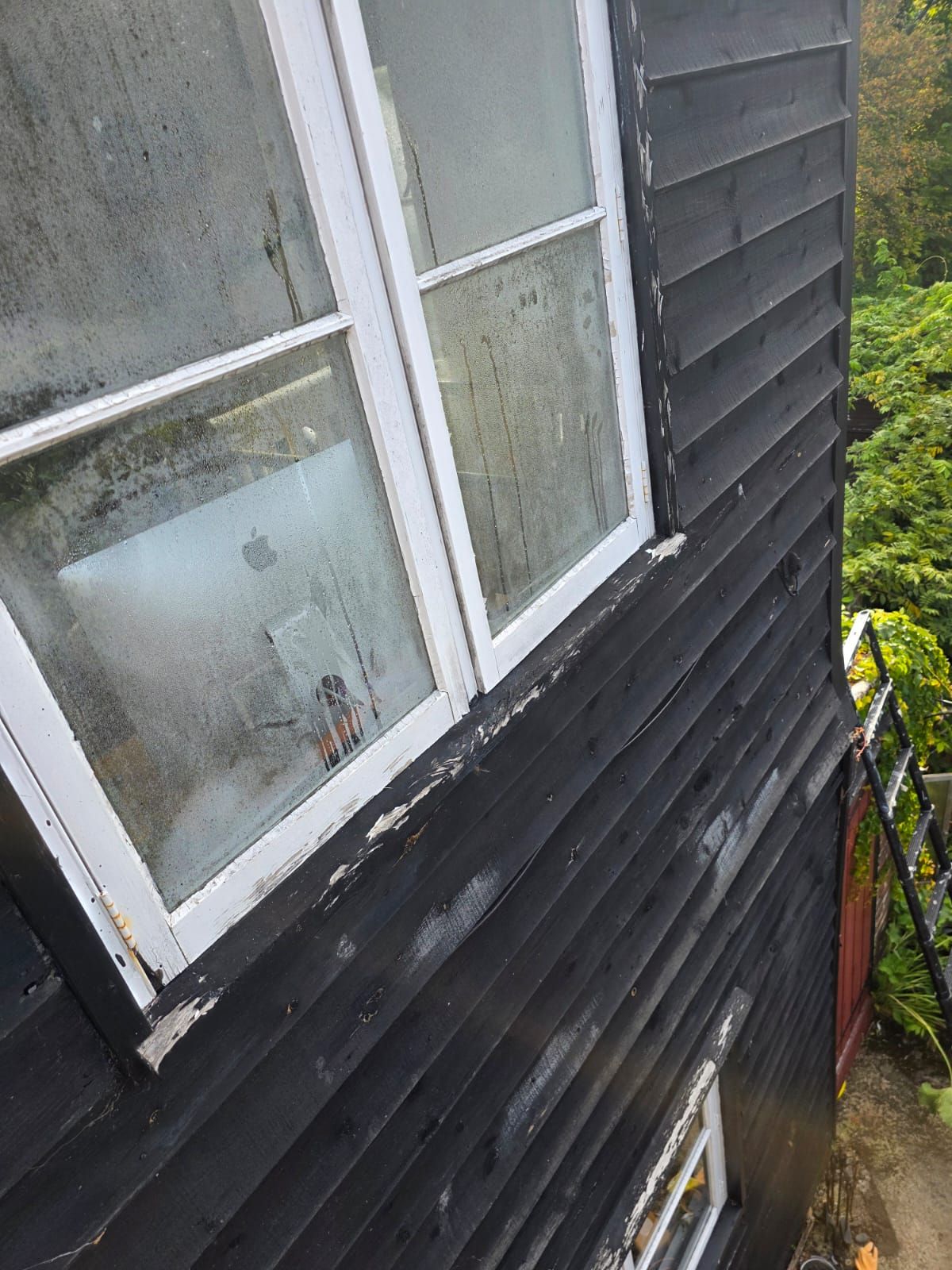 Rear window before, with worn paint